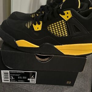 Jordan 4 Retro Black Yellow Sneakers